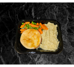 Home made individual steak pie, mashed potatoes, peas,carrots and gravy